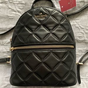 Interior slip pocket
Exterior zip pocket
Dust bag not included
Style # wkru7075